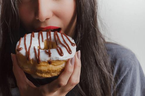 Pregnancy diet - snacking on a doughnut