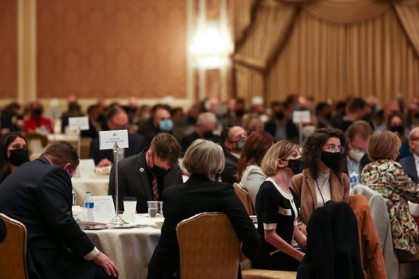 People listen as Gov. Spencer Cox speaks at the 2022 Utah Eco<em></em>nomic Outlook &amp; Public Policy Summit at the Grand America in Salt Lake City on Thursday, Jan. 13, 2022.