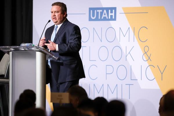 Phil Dean, public finance senior research fellow at the Kem C. Gardner Policy Institute, speaks at the 2022 Utah Eco<em></em>nomic Outlook &amp; Public Policy Summit at the Grand America in Salt Lake City on Thursday, Jan. 13, 2022.