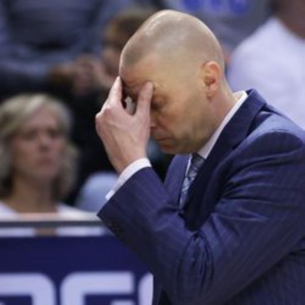 Brigham Young Cougars head coach Mark Pope holds his head after a big Go<em></em>nzaga Bulldogs run during the first half in Provo on Saturday, Feb. 5, 2022.