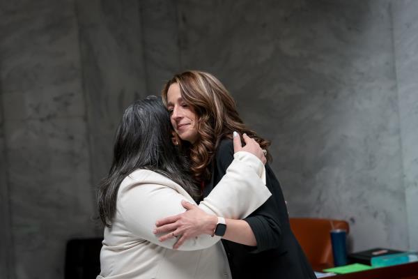 Luna Banuri, executive director of the Utah Muslim Civic League, left, hugs Utah first lady Abby Cox after they each came to support HCR16, which recognizes student athletes’ rights to religious freedom and modesty, at the Capitol in Salt Lake City on Thursday, Feb. 24, 2022.