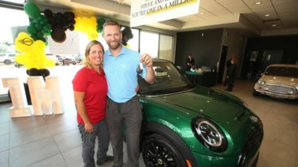 Kerry and Steve Lockhart at Mini Calgary with the one millio<em></em>nth MINI 3 door sold globally.